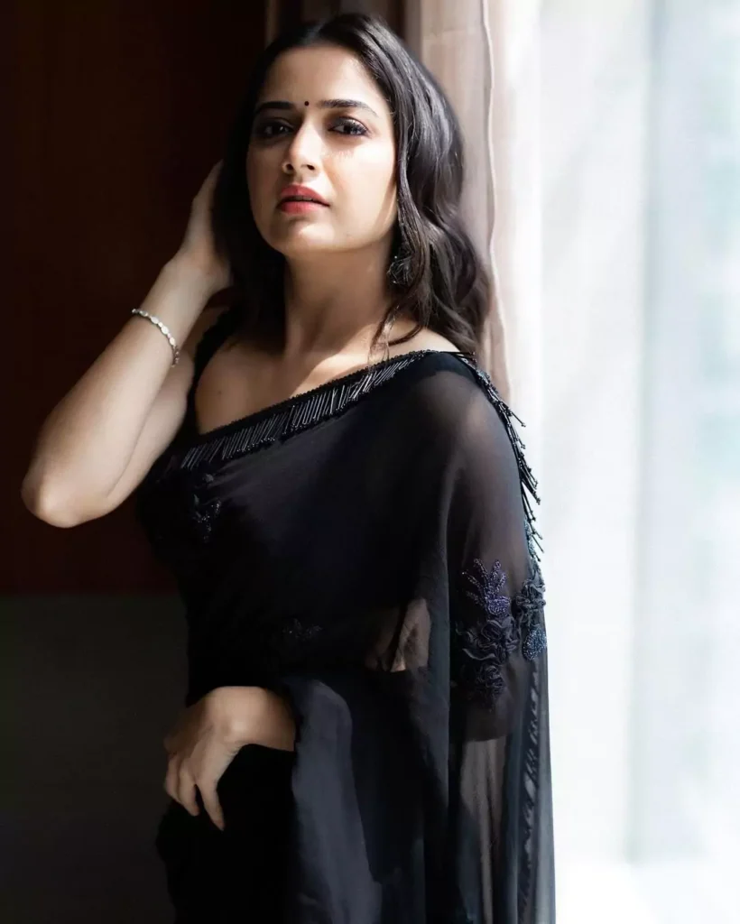 Ashika Ranganath in Black share image looking very hot